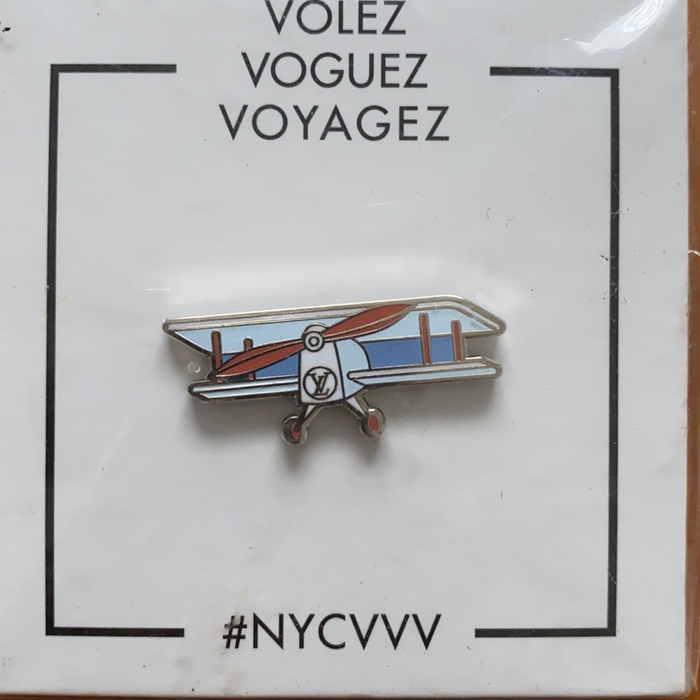 Louis Vuitton exhibit pin